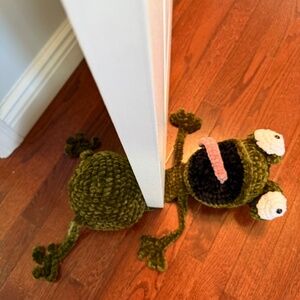 Velvet soft squished green frog door stop